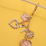 Pressed Flower Bow Pearl Heart Bag Charm – Gold Plated