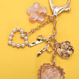 Pressed Flower Bow Pearl Heart Bag Charm – Gold Plated