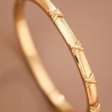 18k Woven X Bangle