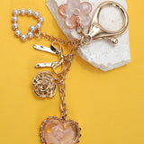 Pressed Flower Bow Pearl Heart Bag Charm – Gold Plated
