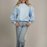 The Aurora Oversized Sweatshirt with Sleeve Bow Details