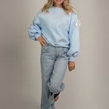 The Aurora Oversized Sweatshirt with Sleeve Bow Details